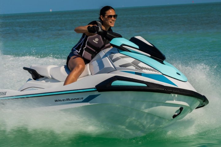 a person riding a wave on a surfboard in the water